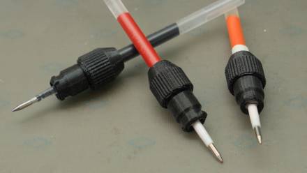 Several 3D-printed pen holders, including their pen refills. They are ready to use.